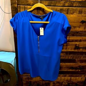 Express top with tags. Never worn, great work shirt!